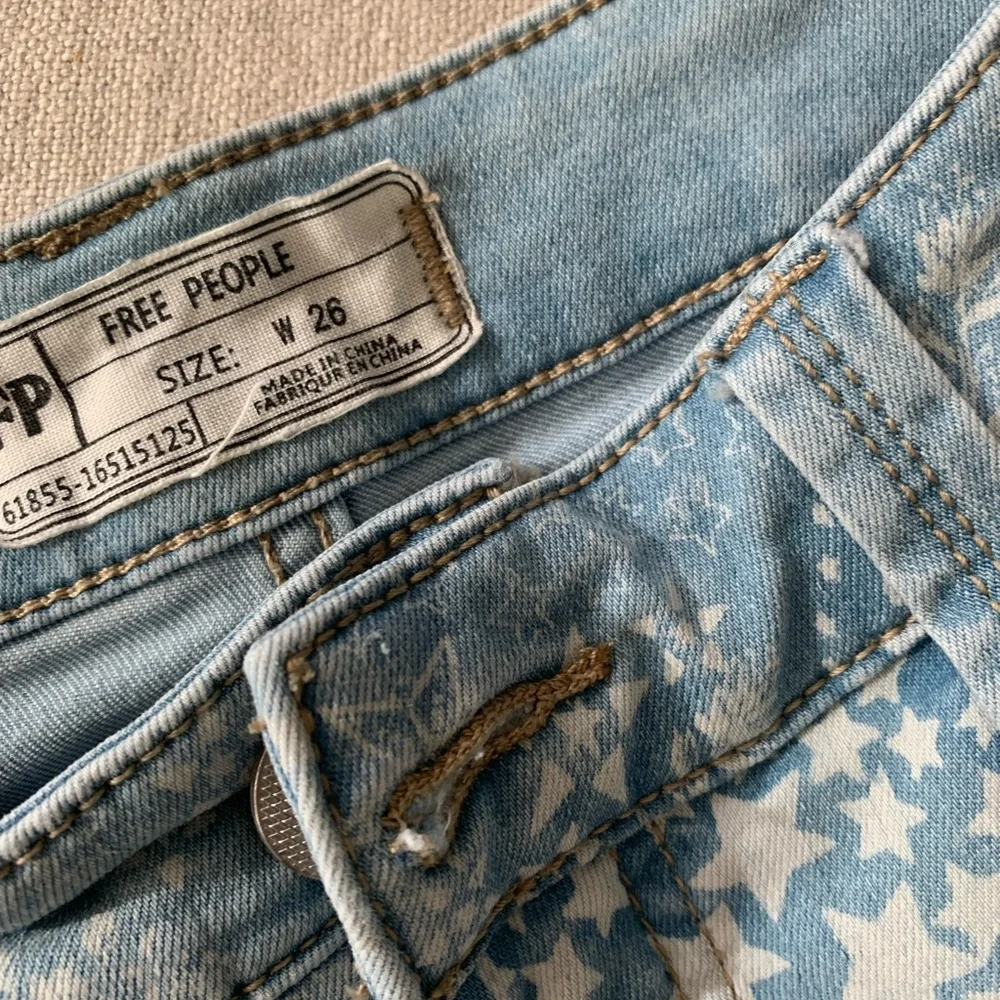 FREE PEOPLE, Float on Flares, Boho Light Blue Denim w Stars & Flowers, Size 26 - Picture 3 of 10